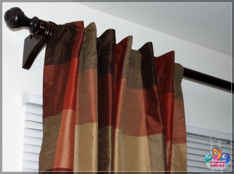 cornisa Las cortinas en una cornisa redonda se usan a menudo junto con persianas