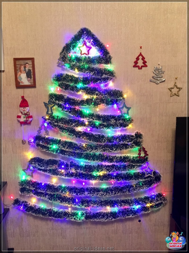 Árboles de Navidad en la pared con tus propias manos: Foto Cómo hacer un árbol de Navidad desde guirnaldas, ramas, tablas, bastidores, papeles, oropel, oropel, oropel (árboles, navidad, pared, propias) Árboles de Navidad en la pared con tus propias manos: Foto Cómo hacer un árbol de Navidad desde guirnaldas, ramas, tablas, bastidores, papeles, oropel, oropel, oropel