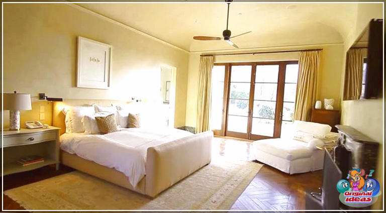 maison Chambre des maîtres dans maison de luxe avec parquet cheminée