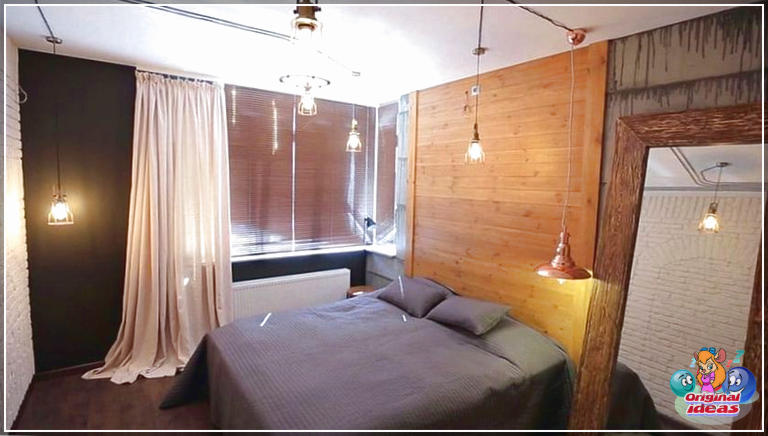 Idées élégantes de chambre loft (images de conception) () Chambre loft avec mur d'accent en bois, briques peintes en blanc et suspensions Edison