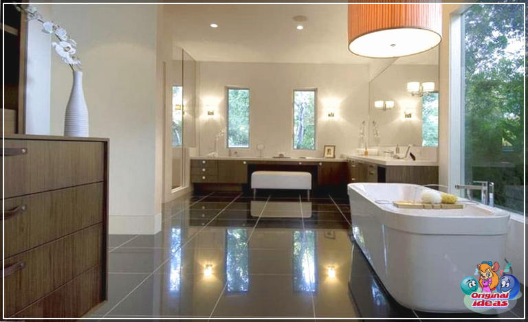 40 idées de design de salle de bain moderne (photos) () Salle de bain principale moderne avec baignoire autoportante noire, planchers de granit et comptoirs blancs