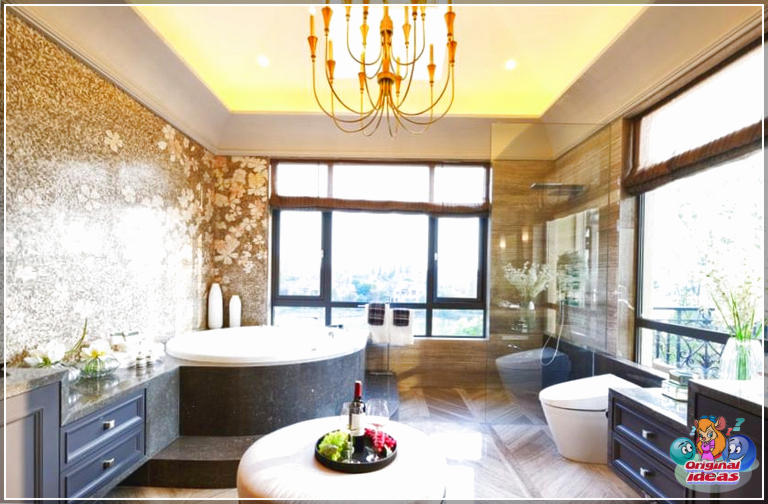 40 idées de design de salle de bain moderne (photos) () Salle de bain moderne avec grande baignoire ronde, vanité sombre, vue sur l'extérieur et lustre