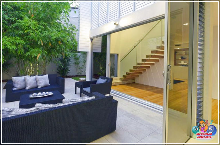 pátios Quintal moderno com área de entretenimento em casa australiana elegante